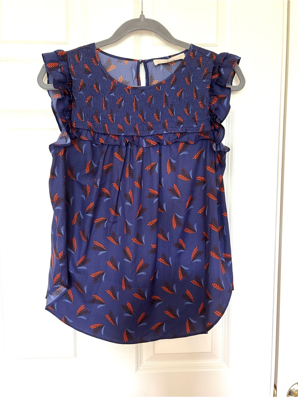LOFT Navy Blue Sleeveless Flutter Ruffle Camisole with Orange Leaf Print